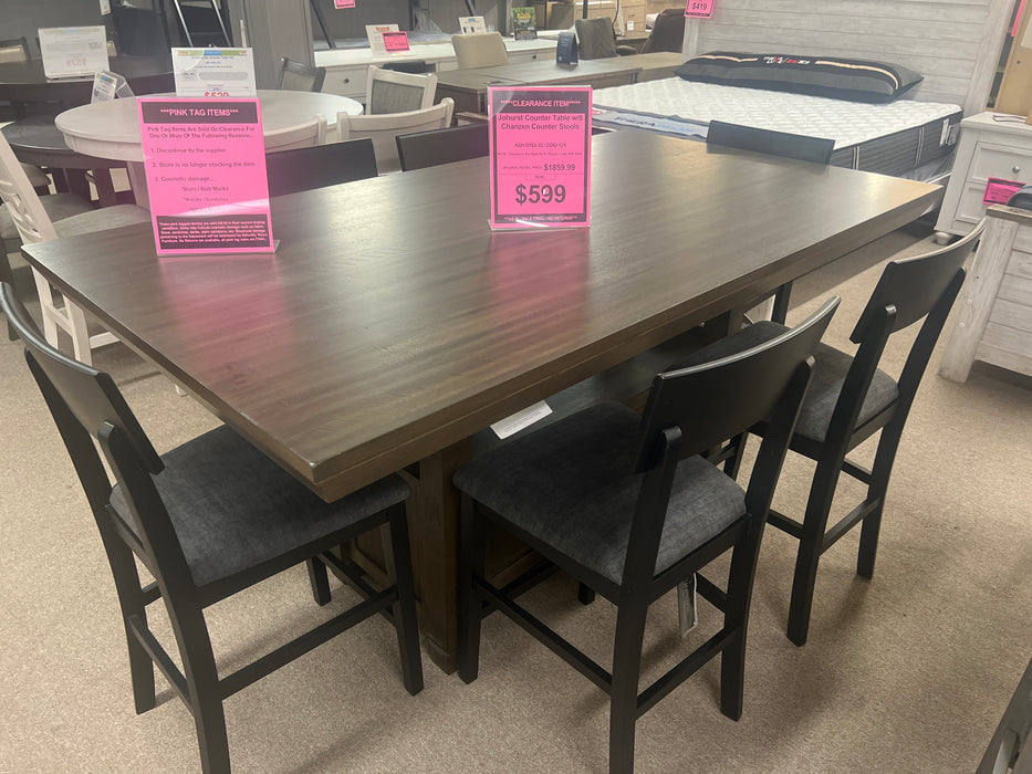 Johurst storage counter table with 6 chanzen counter stools